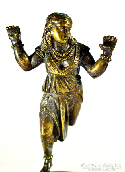 Ancient woman dancing (?) Patinated bronze statue