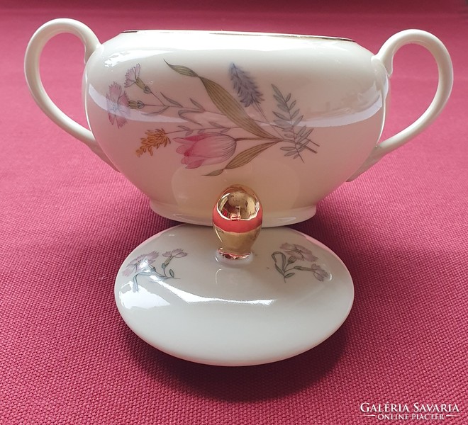 Porcelain sugar bowl with a flower pattern with a golden edge