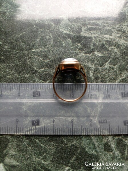 Gold ring with aquamarine stones