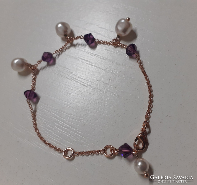 Gold-plated bracelet with a sparkling faceted crystal and pearl pendant