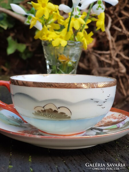 Oriental geisha eggshell porcelain cup and saucer