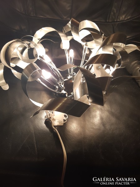 Silver colored metal wall lamp