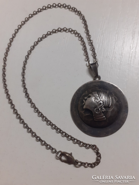 Retro fine condition silver-plated industrial art pendant on a chain