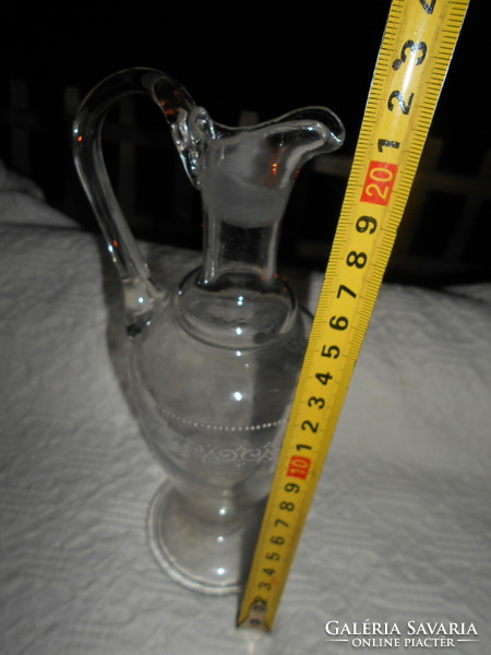 Antique broken, numbered glass decanter