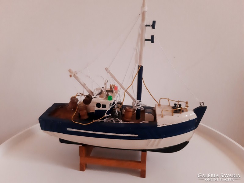 Old wooden fishing boat ornament
