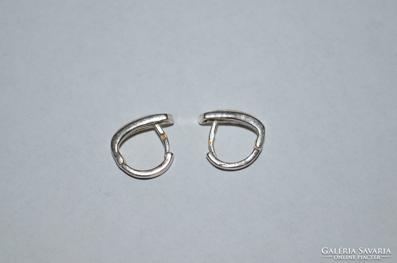 Silver earrings with a small stone