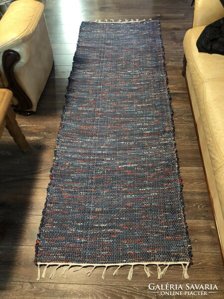 Handwoven rag rug with a blue pattern