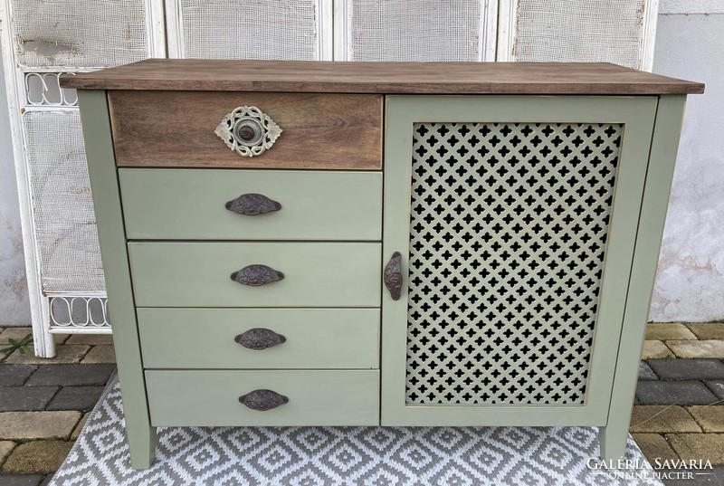 Chest of drawers with an oriental feel, antiqued with gold, with cast iron handles...