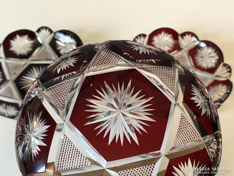 3 burgundy-colored incised crystal serving bowls with candied hazelnuts