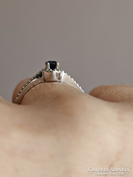 White gold sapphire-diamond ring