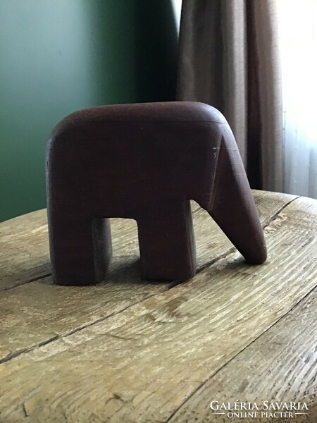 Old stylized wooden elephant statue, perhaps rosewood?