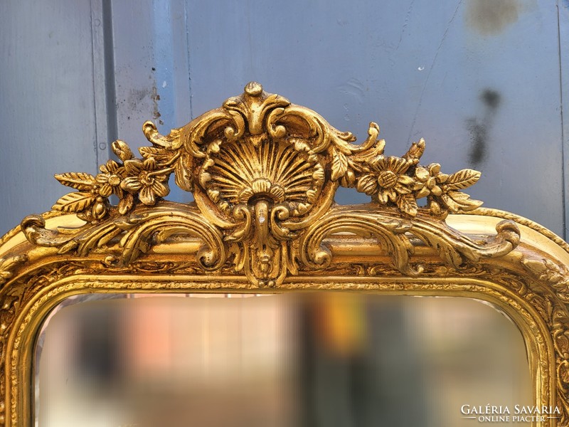 Gilded French mirror with shell decoration
