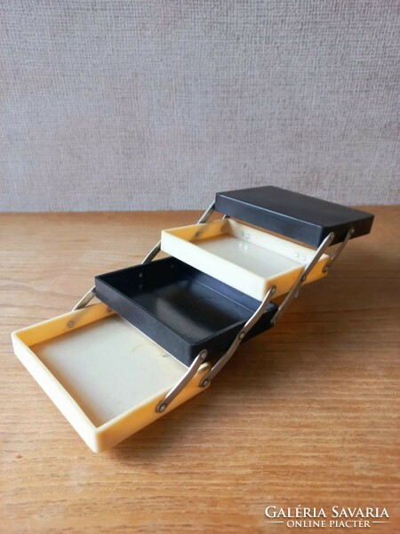 Retro plastic double-sided box. Black and white. Jewelry box.