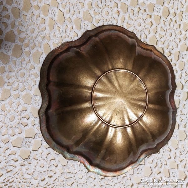 Copper round serving tray, center of the table