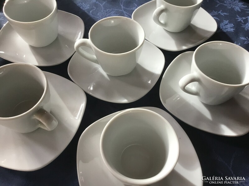 6 white coffee cups with a small plate, in perfect condition