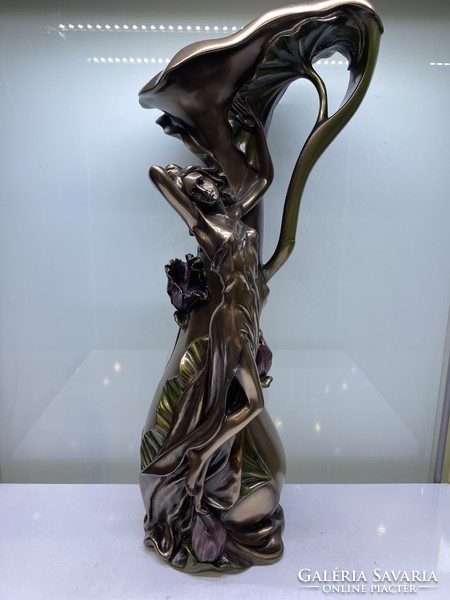 Bronzed female figure vase, statue