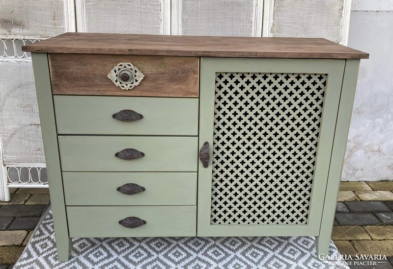 Chest of drawers with an oriental feel, antiqued with gold, with cast iron handles...