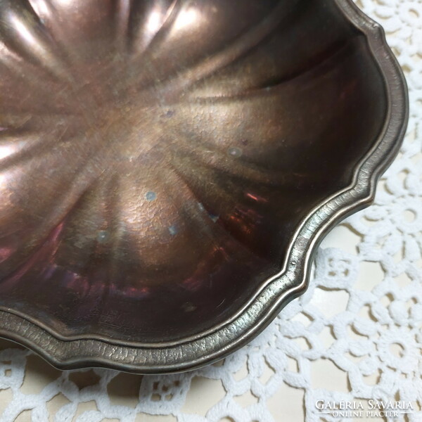 Copper round serving tray, center of the table