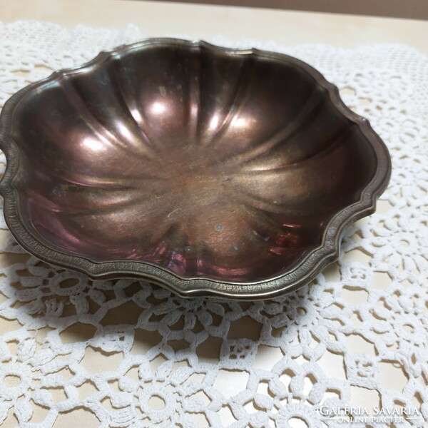 Copper round serving tray, center of the table