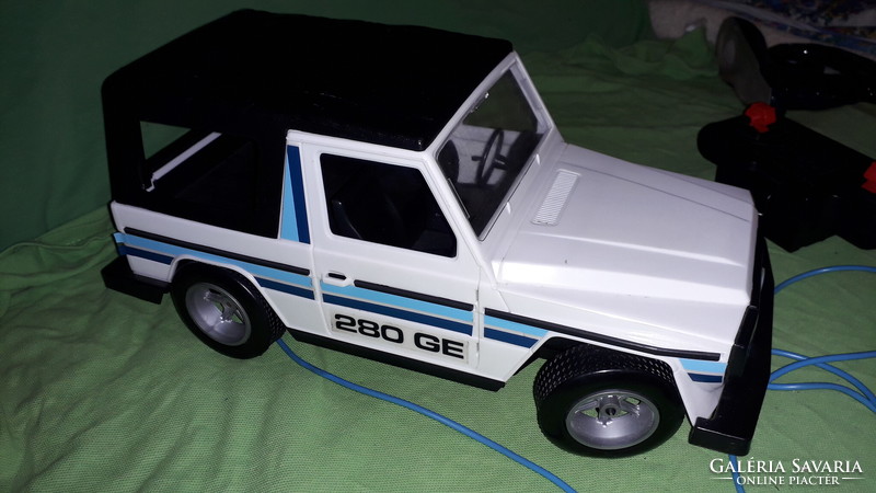 Old Yugoslavian mechanical engineering Mercedes 280 ge wire remote toy car in incredible condition