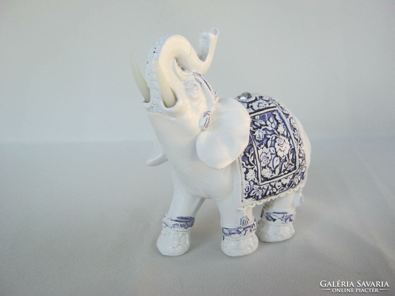 Elephant figurine with blue decoration