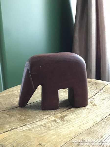 Old stylized wooden elephant statue, perhaps rosewood?