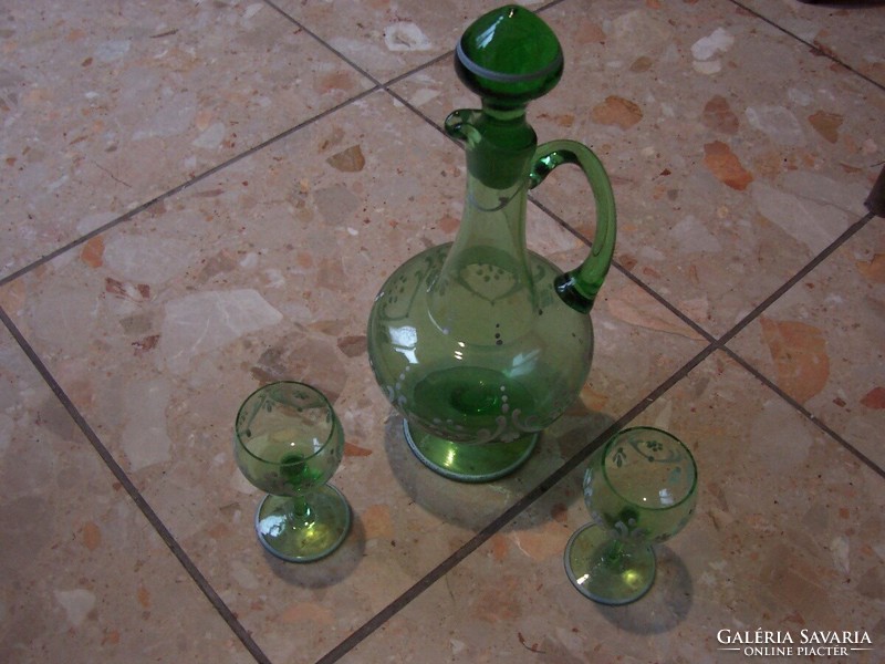 Green corked bottle with 2 glasses