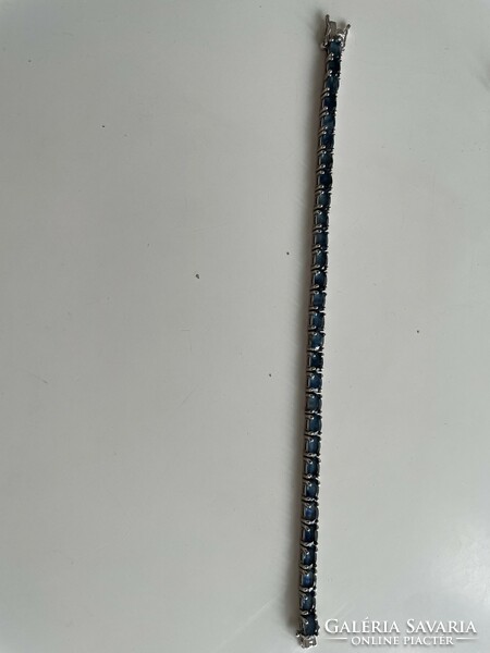 Csillogó kék zafír 925 st. ezüst tenisz karkötő.