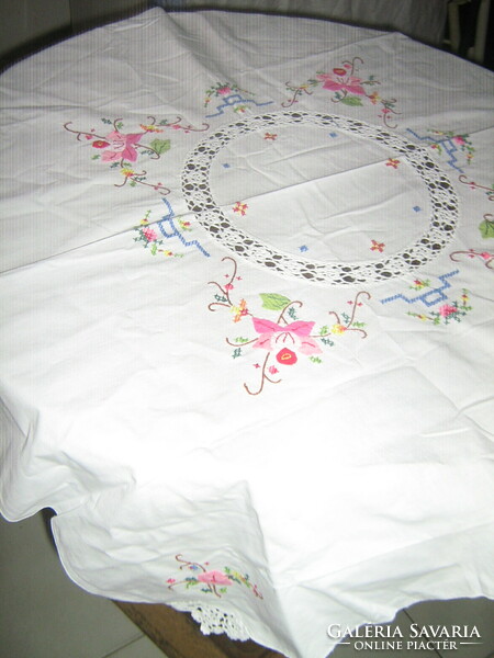 Beautiful small cross-stitch embroidered crochet and stitched floral tablecloth