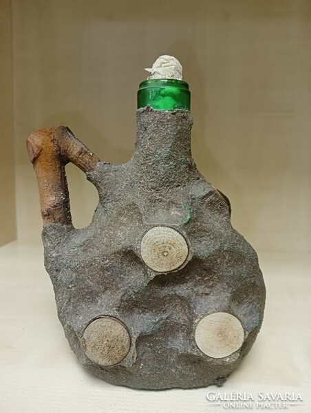 Glass bottle with human head