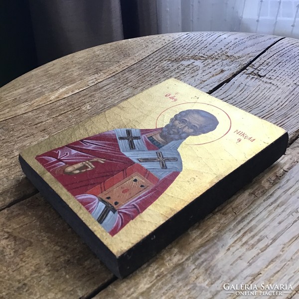 Old hand painted icon on wooden board