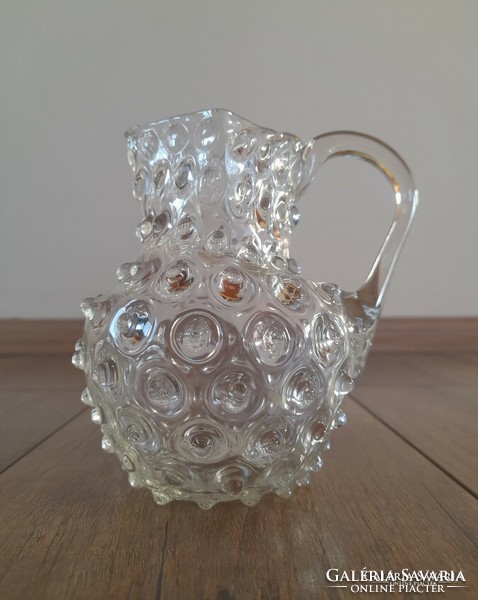 Antique blown glass small jug with a cam