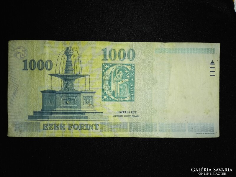HUF 1,000 millennium banknote each.