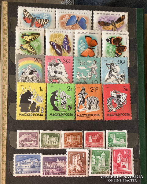 Magyar postatiszta bélyegek az 1957 -1967 időszakból régi csatos albumba rendezve