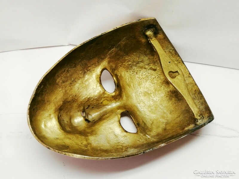 Bronze wall mask trio with enameled decoration, polished. An Indian rarity