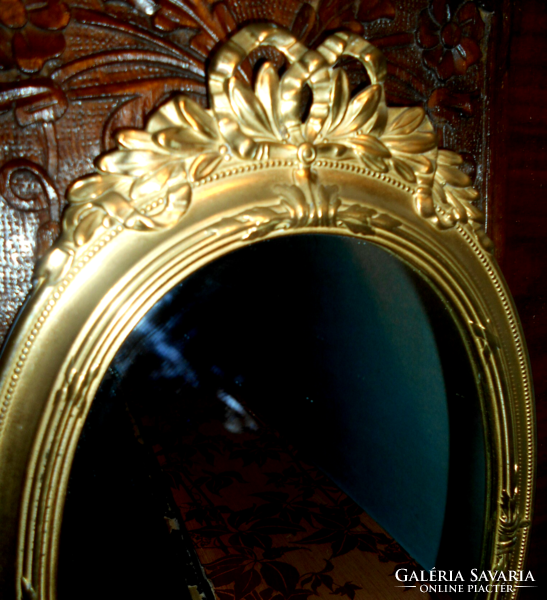 Baroque style wall mirror in a copper frame