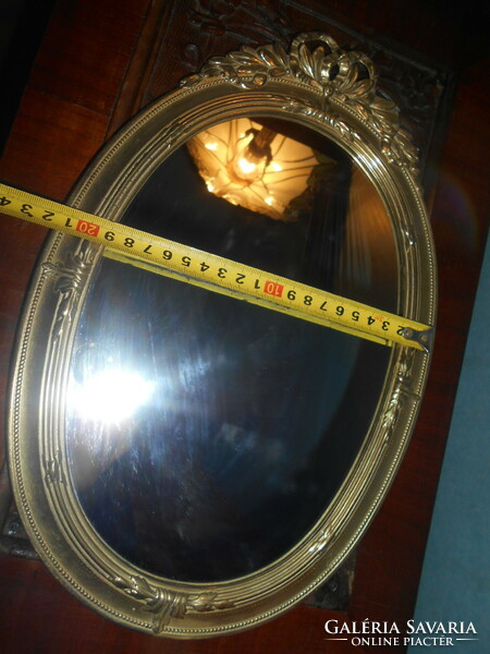 Baroque style wall mirror in a copper frame