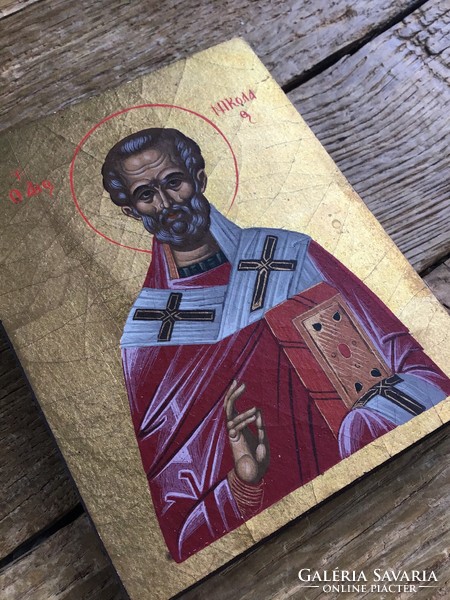 Old hand painted icon on wooden board