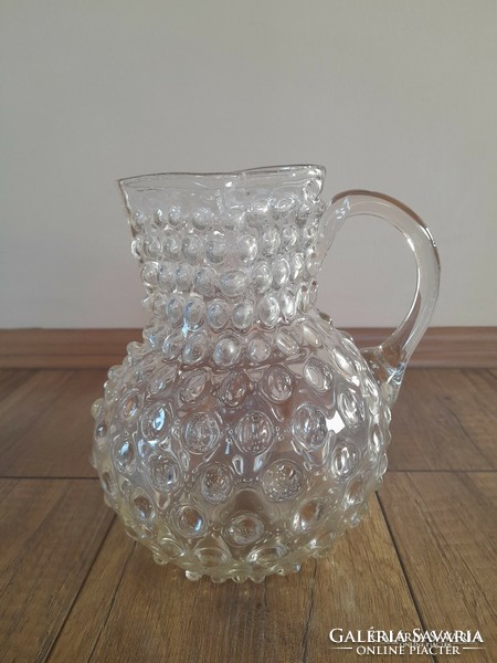 Antique blown glass jug with a knob