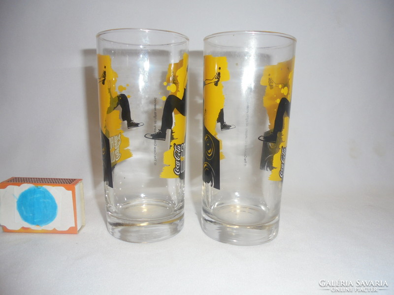 Two collecting coca-cola glasses, tube glass - together