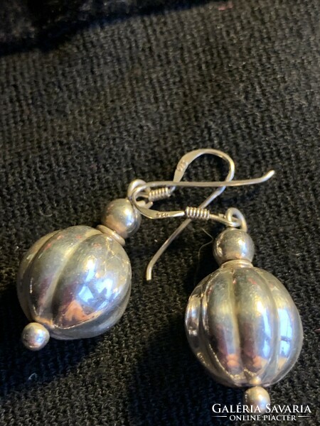 Silver earrings marked