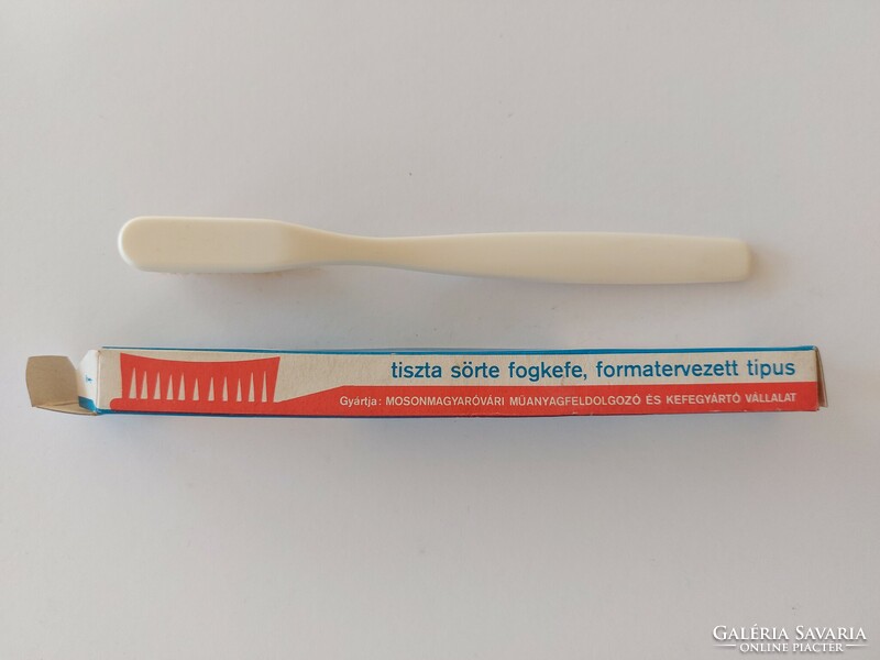 Retro amondent advertising item in an old toothbrush box