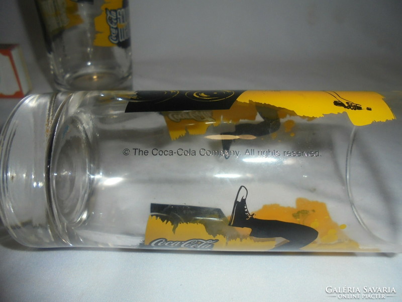 Two collecting coca-cola glasses, tube glass - together