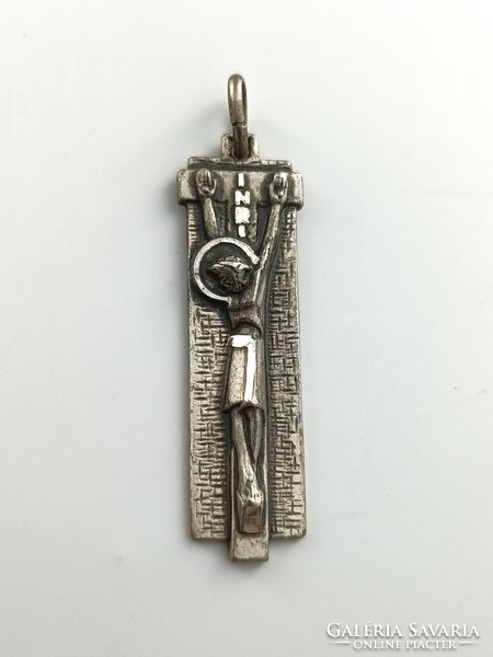 Silver pendant stylized Jesus