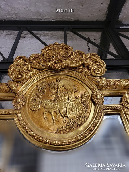 Gilded mirror decorated with equestrian scene