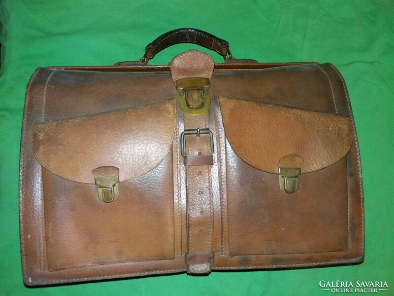 Antique hardened leather medical bag with copper buckle in good condition 44x32x14 cm as shown in the pictures