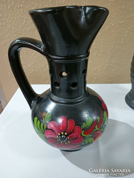 Ceramic jug with a black flower motif