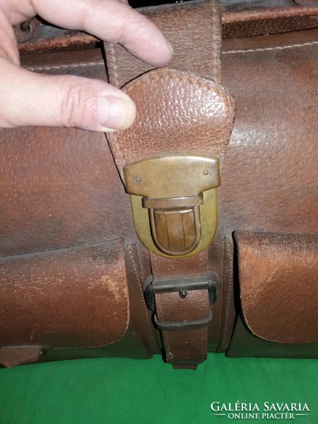 Antique hardened leather medical bag with copper buckle in good condition 44x32x14 cm as shown in the pictures