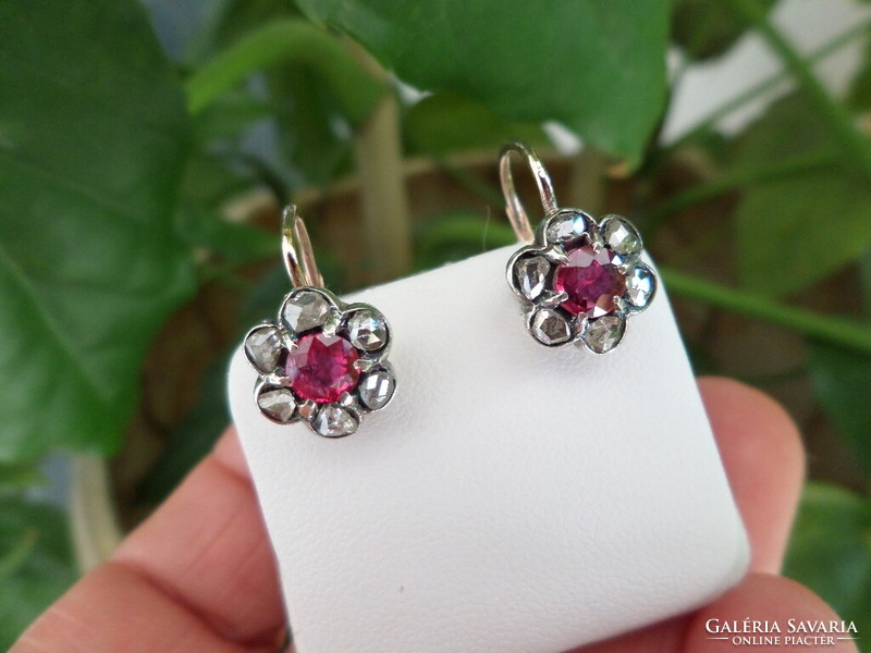 Antique gold earrings with a pair of diamonds and 1 beautiful colored genuine ruby