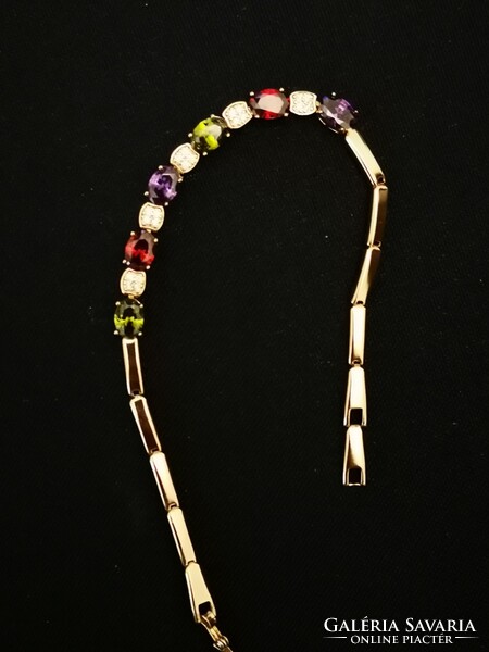 Aranyozott női karkötő, színes kristályokkal. Gold-plated women's bracelet with colorful crystals